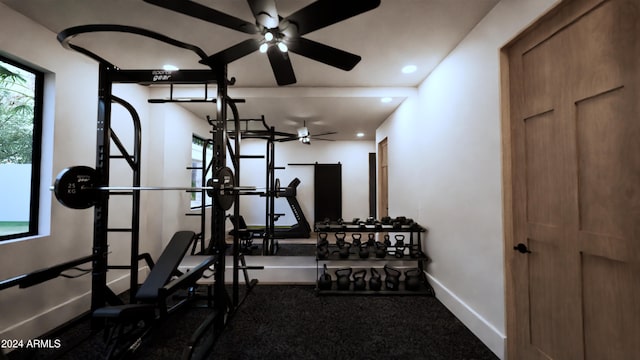 workout area featuring ceiling fan