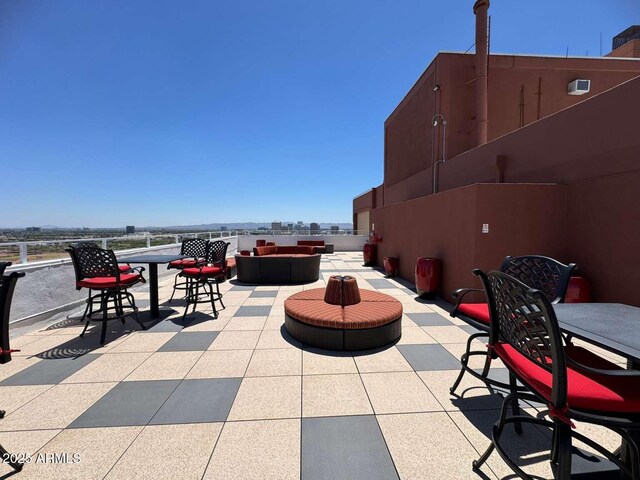 4750 N Central Ave Unit R3, Phoenix, AZ 85012 - view of patio with an outdoor hangout area and outdoor dining area