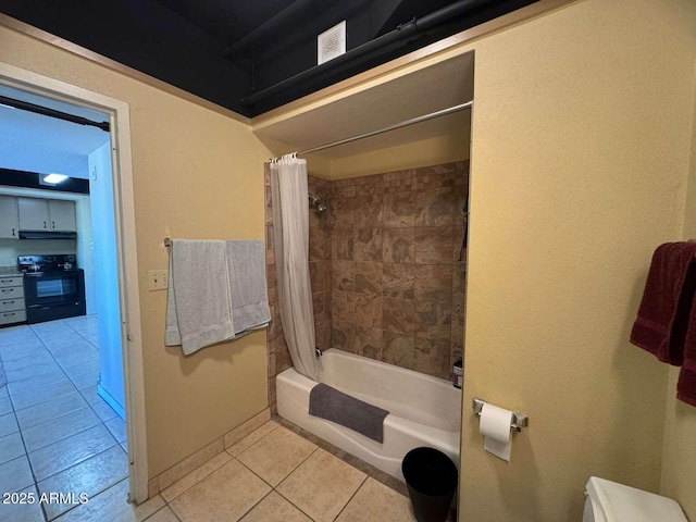4750 N Central Ave Unit R3, Phoenix, AZ 85012 - bathroom with tile patterned floors, shower / bath combination with curtain, and baseboards