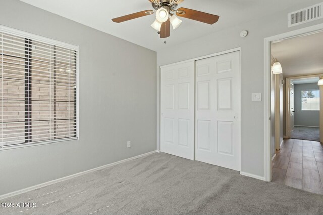 4634 W Aire Libre Ave, Glendale, AZ 85306 - unfurnished bedroom with a closet, visible vents, baseboards, and carpet floors