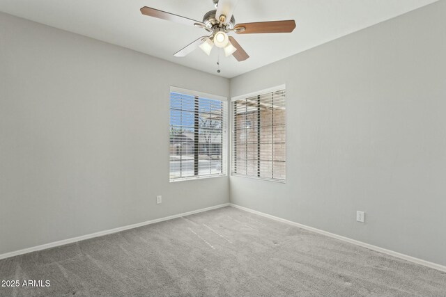 4634 W Aire Libre Ave, Glendale, AZ 85306 - carpeted empty room featuring baseboards and ceiling fan