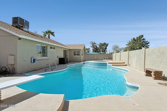 4634 W Aire Libre Ave, Glendale, AZ 85306 - view of swimming pool with cooling unit, a patio, a fenced in pool, and a fenced backyard