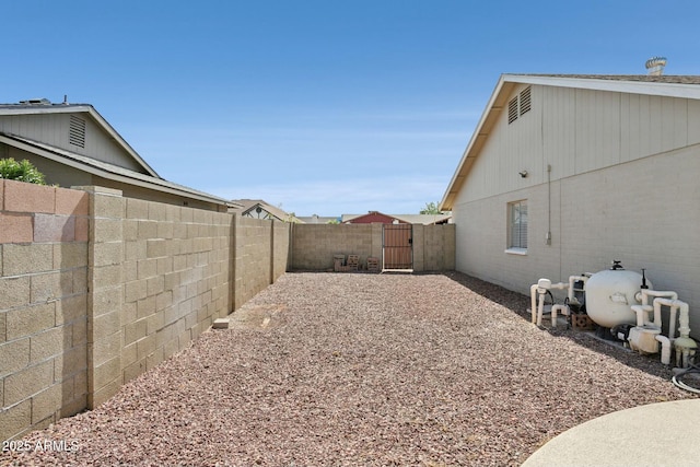 4634 W Aire Libre Ave, Glendale, AZ 85306 - view of yard with a gate and a fenced backyard