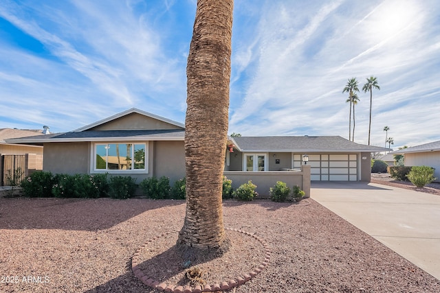 single story home featuring a garage