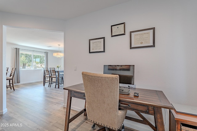 office area featuring light hardwood / wood-style floors