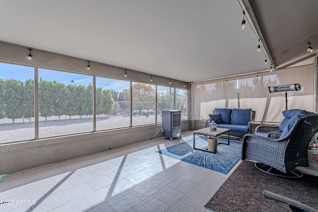 sunroom with rail lighting