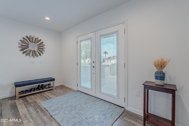 entryway featuring french doors and hardwood / wood-style floors