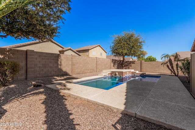 view of swimming pool with a patio area, a fenced backyard, and a fenced in pool