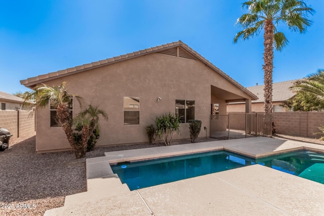 view of swimming pool with a fenced backyard, a patio area, and a fenced in pool