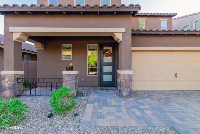 entrance to property with a garage