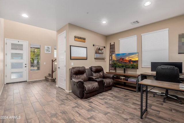 office with wood-type flooring