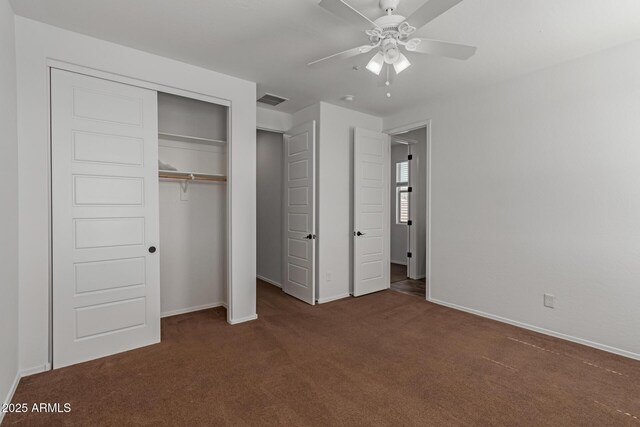 laundry area with washing machine and clothes dryer and light wood-type flooring