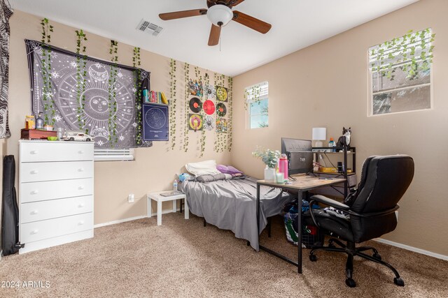 bedroom featuring ceiling fan and carpet floors