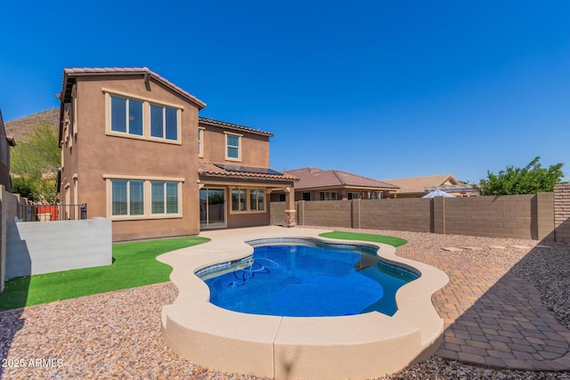 view of pool with a fenced in pool, a fenced backyard, and a patio area