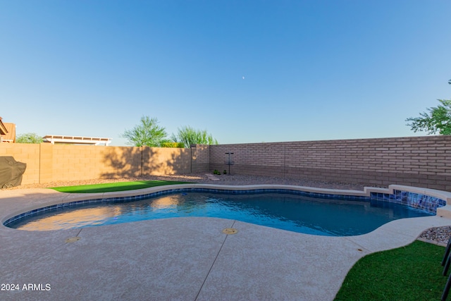 view of swimming pool featuring a patio