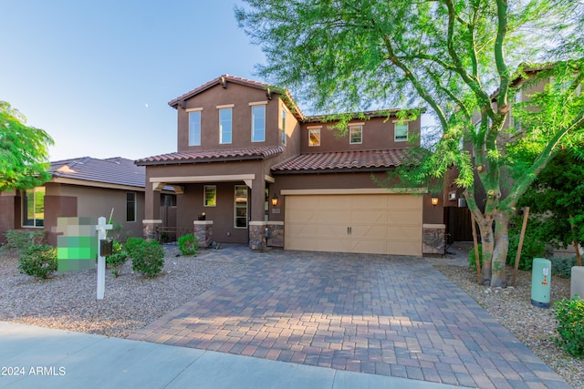 view of front of property featuring a garage