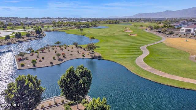 birds eye view of property featuring a water and mountain view