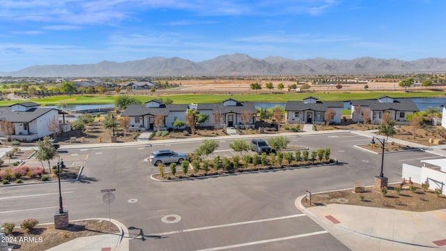 birds eye view of property with a mountain view