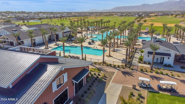 birds eye view of property featuring a mountain view