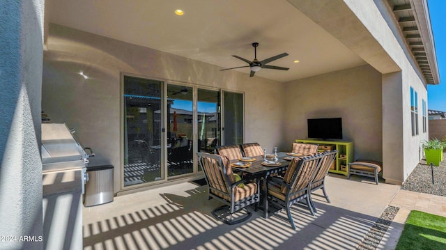 view of patio with ceiling fan and exterior kitchen