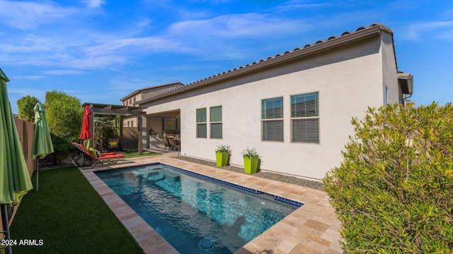 back of property featuring a patio area