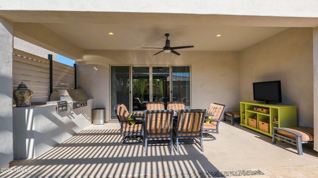 view of patio / terrace with a grill and ceiling fan