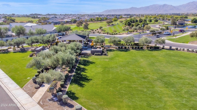 birds eye view of property with a mountain view