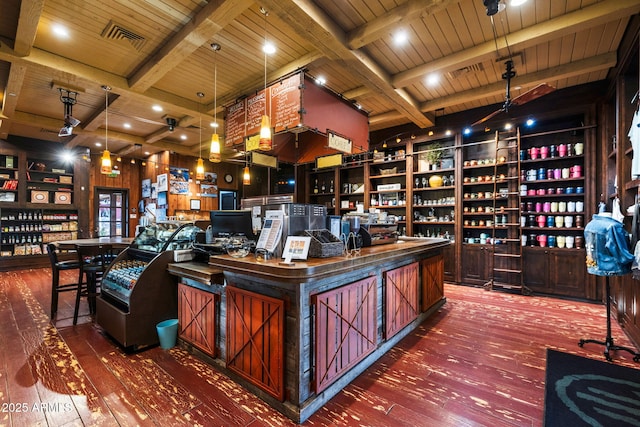 office area featuring hardwood / wood-style floors, wooden ceiling, beamed ceiling, and wooden walls