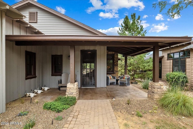 back of house with covered porch