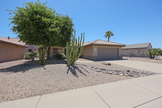 view of front of property featuring a garage