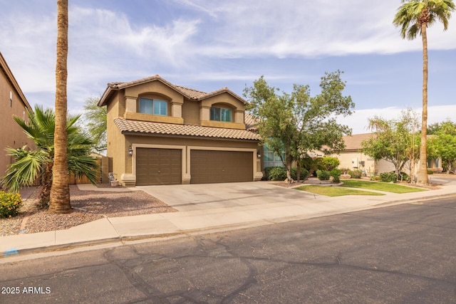 9708 E Pampa Ave, Mesa, AZ 85212 - mediterranean / spanish house with an attached garage, stucco siding, concrete driveway, a tile roof, and fence