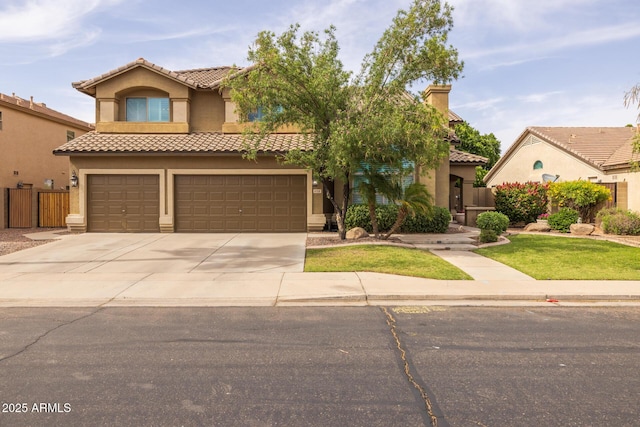 9708 E Pampa Ave, Mesa, AZ 85212 - mediterranean / spanish-style house with a tile roof, stucco siding, a garage, concrete driveway, and a chimney