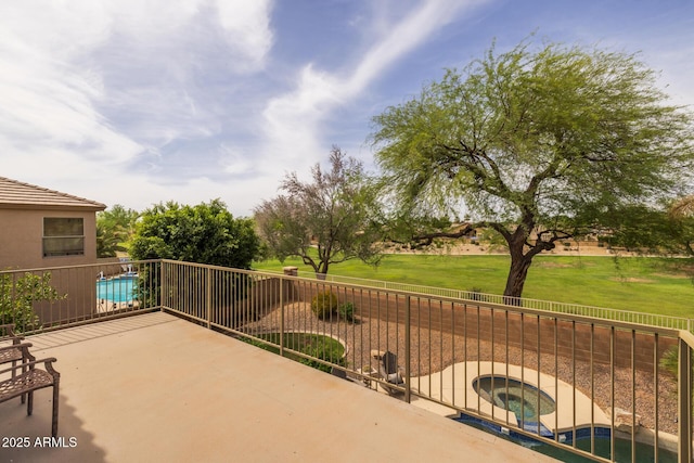 9708 E Pampa Ave, Mesa, AZ 85212 - view of patio / terrace with an in-ground hot tub and fence