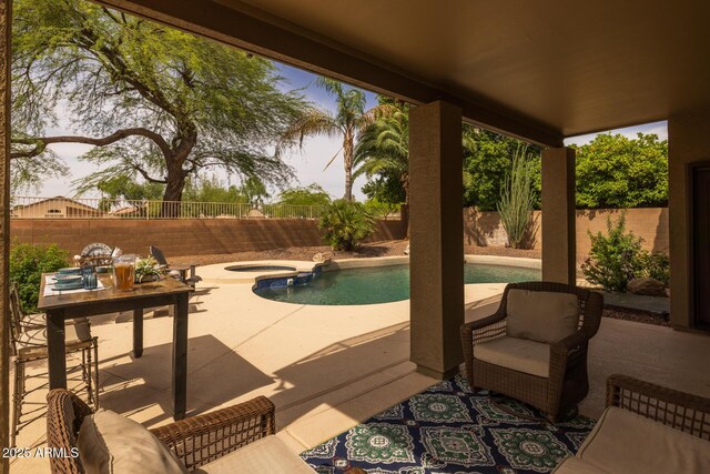 9708 E Pampa Ave, Mesa, AZ 85212 - view of pool featuring a patio area, a fenced backyard, and a pool with connected hot tub