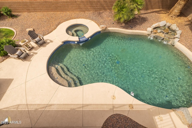 9708 E Pampa Ave, Mesa, AZ 85212 - view of pool with a pool with connected hot tub, a patio area, and a fenced backyard