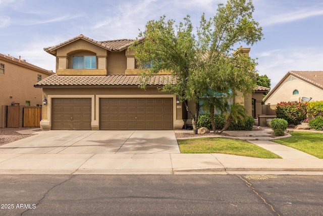 9708 E Pampa Ave, Mesa, AZ 85212 - mediterranean / spanish-style home with a tiled roof, stucco siding, and driveway