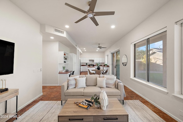 living room with ceiling fan