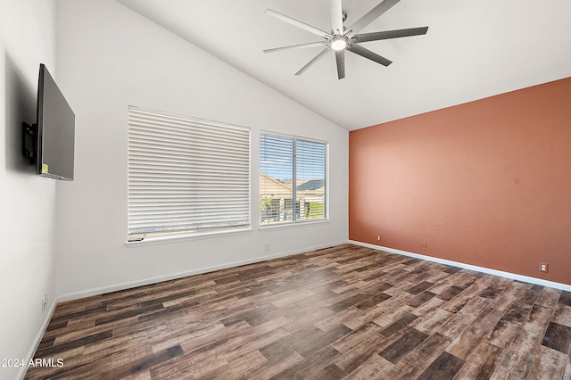 unfurnished room with ceiling fan, dark hardwood / wood-style flooring, and lofted ceiling