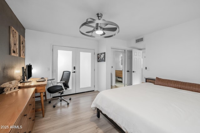 bedroom with a ceiling fan, french doors, visible vents, light wood-type flooring, and access to outside