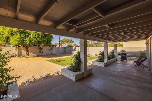 view of patio with a fenced backyard