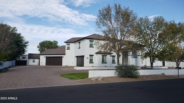 view of front of home with a garage