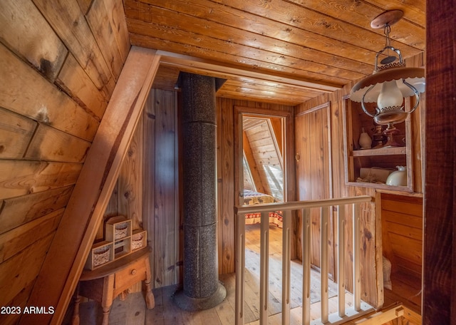 1053 Pond Cir, Forest Lakes, AZ 85931 - stairway with wood walls, hardwood / wood-style flooring, and wood ceiling