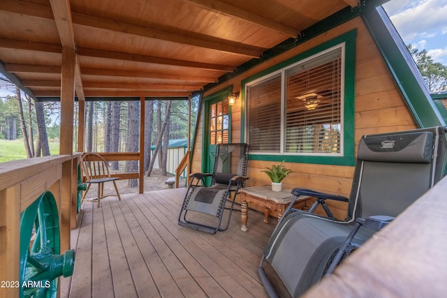 1053 Pond Cir, Forest Lakes, AZ 85931 - sunroom featuring beamed ceiling and a wealth of natural light