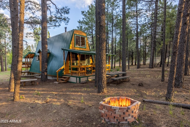 1053 Pond Cir, Forest Lakes, AZ 85931 - exterior space featuring an outdoor fire pit