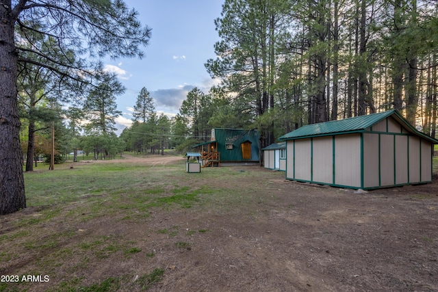 1053 Pond Cir, Forest Lakes, AZ 85931 - view of yard with a shed and an outdoor structure
