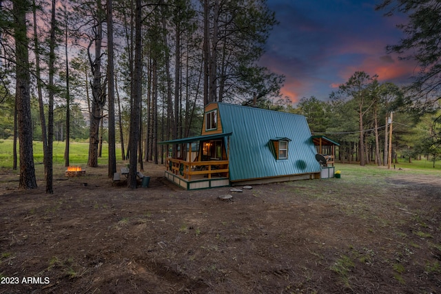 1053 Pond Cir, Forest Lakes, AZ 85931 - view of outdoor structure at dusk