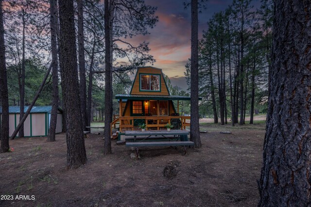 1053 Pond Cir, Forest Lakes, AZ 85931 - exterior space with an outbuilding and metal roof