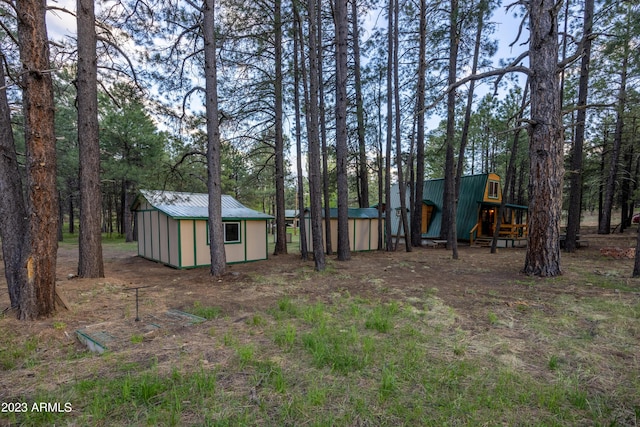 1053 Pond Cir, Forest Lakes, AZ 85931 - view of yard featuring a playground and an outdoor structure