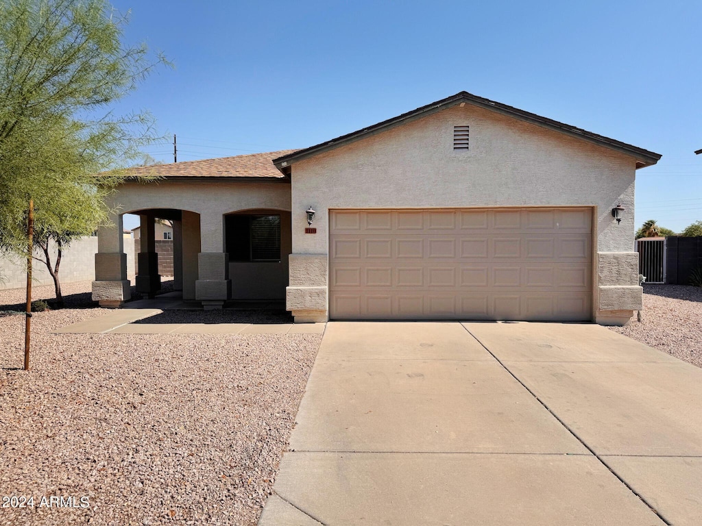 ranch-style house with a garage