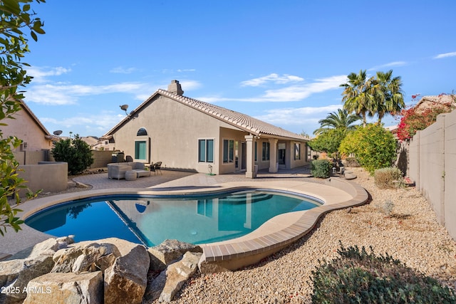 view of pool featuring a patio